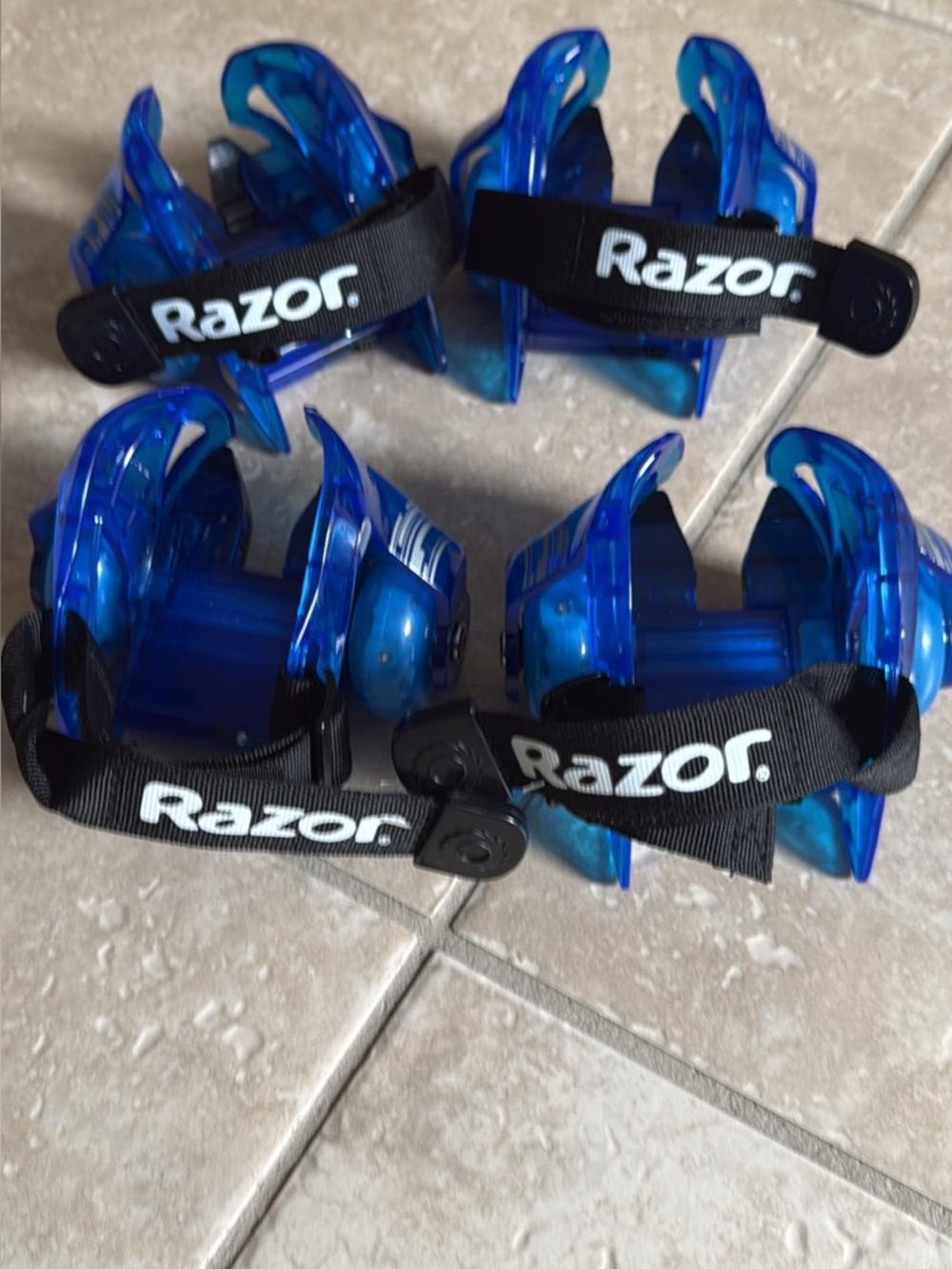 Razor Translucent Blue Clip-On Heel Wheels with Black Straps Two Pair